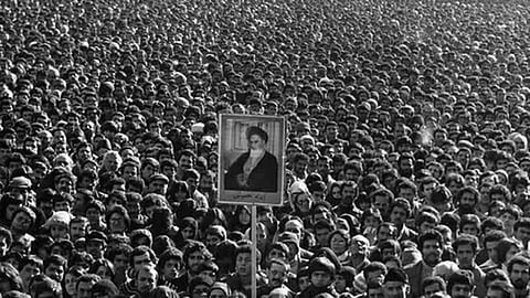 Iran commemorates 1979 revolution as nation is squeezed by anger over crackdown, tensions with US