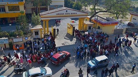 Students queue up outside an examination centre as the Central Board of Secondary Education (CBSE) Class 10 and 12 board examinations commence, in Ranchi, Tuesday, Feb. 17, 2026.