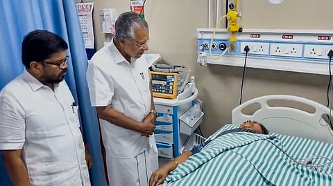 Kerala Chief Minister Pinarayi Vijayan meets state Health Minister Veena George after she was allegedly injured during a protest by activists of the Congress student wing, KSU, at Kannur railway station, Kerala, Wednesday, Feb. 25, 2026