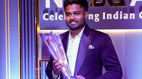 Indian men's cricket team player Sanju Samson with a trophy during the BCCI Naman Awards 2026, in New Delhi, Sunday, March 15, 2026.