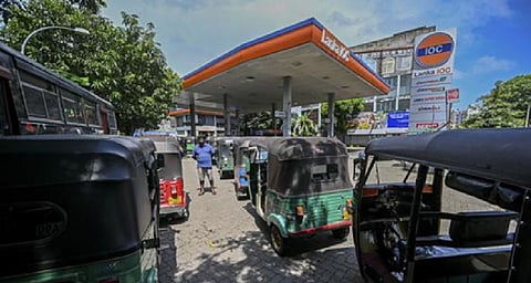 Sri Lanka urges sparing use of power, fuel; hikes prices again