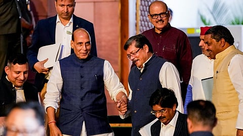 Union Defence Minister Rajnath Singh, Congress MPs Mukul Wasnik and Tariq Anwar, Samajwadi Party (SP) MP Dharmendra Yadav and others leave after the all-party meeting convened by the government to discuss the ongoing West Asia crisis, in New Delhi, Wednesday, March 25, 2026.