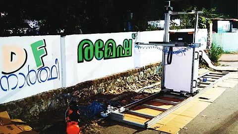 From hand-painted walls to robot: Tradition meets technology in Kerala's election campaigning