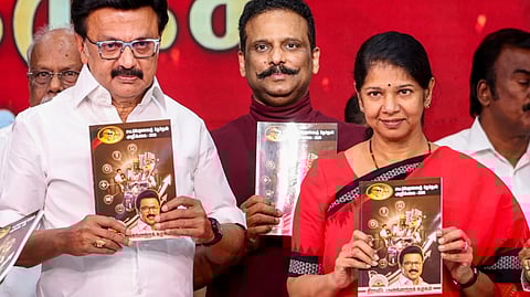 MK Stalin and Kanimozhi jointly release DMK poll manifesto.