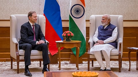 Prime Minister Narendra Modi with Russia First Deputy Chairman Denis Manturov during a meeting, in New Delhi.