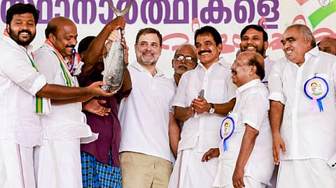 Leader of Opposition in the Lok Sabha and Congress leader Rahul Gandhi, centre, with party MP KC Venugopal and others including candidate G Sudhakaran during a campaign event ahead of the Kerala assembly elections, in Alappuzha district, Kerala.