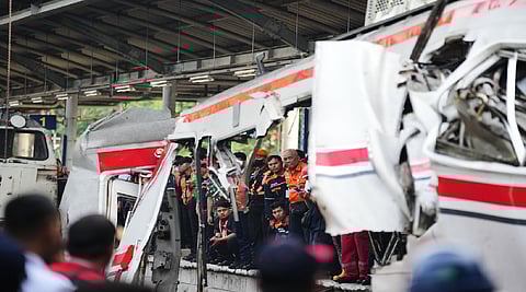 The death toll in the train crash outside Indonesia's capital climbed to 14.