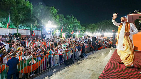 Prime Minister Narendra Modi waves to the gathering during an event celebrating the BJP's performance in Assembly election results across four states and one union territory, at the party headquarters in New Delhi, Monday, May 4, 2026.