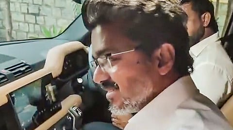 TVK chief and candidate from the Tiruchirappalli East constituency, Vijay, leaves from his residence as he leads in vote counting in the Tamil Nadu Assembly election results, in Chennai, Monday, May 4, 2026.