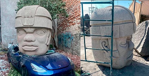 Tesla es aplastado por cabeza Olmeca en la colonia Roma, CDMX