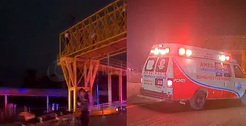 Rescatistas de Tarímbaro logran bajar a hombre de lo alto de puente peatonal