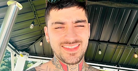 ¡Ya llegó a México! Zayn Malik se toma foto con fan en aeropuerto de CDMX