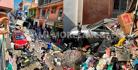 Michoacán: recolectora de basura se queda sin frenos, embiste autos y choca contra casa