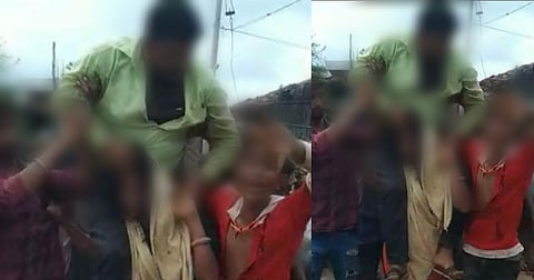 मध्यप्रदेशः प्रेमी के साथ रह रही आदिवासी महिला से क्रूरता, पति को पत्नी के कंधे पर बैठा कर गाँव में घुमाया, वीडियो वायरल