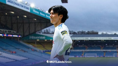 Ao Tanaka looking sad in a Leeds United shirt, ahead of Elland Road.