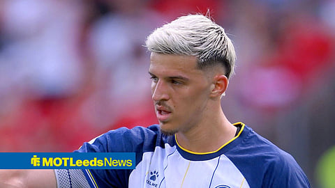 Tarik Muharemovic gesturing with his hand as he plays for Bosnia and Herzegovina at the 2026 World Cup