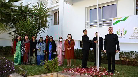 Ambassador Gaurav Ahluwalia and other participants singing the national anthem at the Republic Day celebration in Algiers.