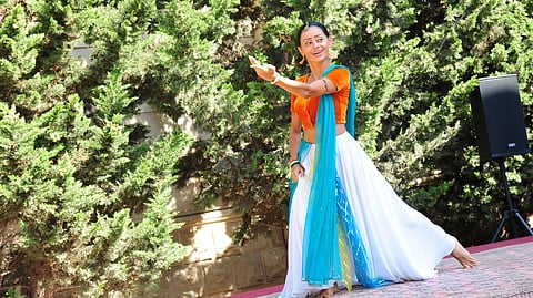 Indian-origin choreographer Somnaz Arti performs at the Indian embassy in Baku on Aug. 15, 2022.