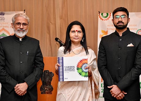 India's ambassador to Kazakhstan, Shubhdarshini Tripathi, unveils 'Varshik Darpan,' a visual chronicle of the Astana-based embassy's activities during 2022 at a ceremony marking the 74th Republic Day of India in Astana, Kazakhstan on Jan. 26.