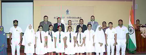 Indian High Commissioner Gopal Baglay, Education Minister Susil Premajayantha, and State Minister of Education A. Aravindh Kumar pose with the recipients of the Mahatma Gandhi Scholarships during a special ceremony in Sri Lanka.
