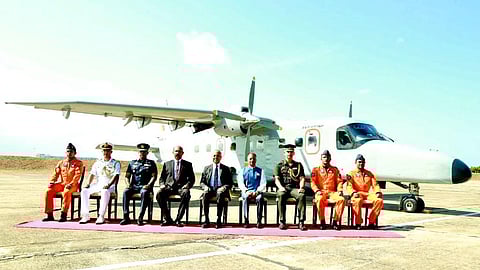 Indian High Commissioner Gopal Baglay presents a Dornier maritime reconnaissance aircraft to Sagala Ratnayaka, Chief of Staff and Senior Adviser to the Sri Lankan President on National Security, at the Sri Lankan Air Force Base in Katunayake on 16 Aug.