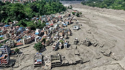 Devastation from Nepal floods: 23 bodies found in a single house; over 4,000 people still missing.