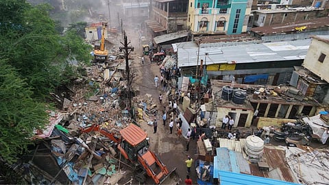 Indore civic officials remove illegal shops and encroachments along the Kanh River
