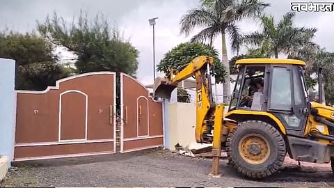 bulldozer action on liquor case accused resort in Sagar