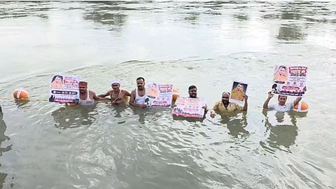 Protesters staging a water satyagraha in Rewa