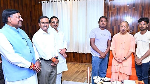 CM Yogi Praises Two Youth for Cleaning Historic Pond Maa Tarkulaha Devi Dham
