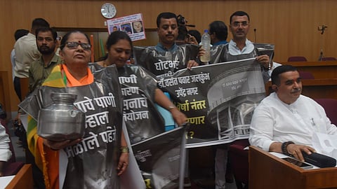 nashik municipal corporation hoarding scam water crisis protest