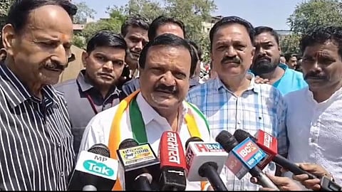 Congress leader Sajjan Singh Verma addressing the media in Indore.