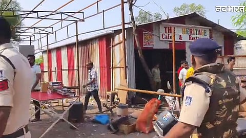 JCB removes illegal shops from medical college allotted land