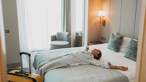 Room rotting gen z travel trend hotel stay 2026.