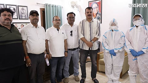 Corona warriors wearing PPE kits meet opposition leader Umang Singhar