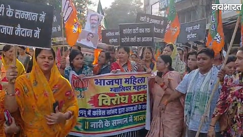BJP women and youth wing members march and burn an effigy of Rahul Gandhi