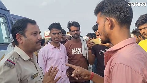 Family members and villagers protest after a fatal bike accident