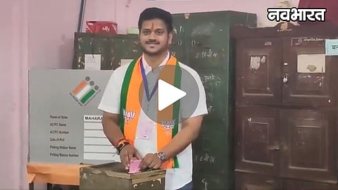 bjp candidate kaustubh gawade lotus symbol scarf voting controversy