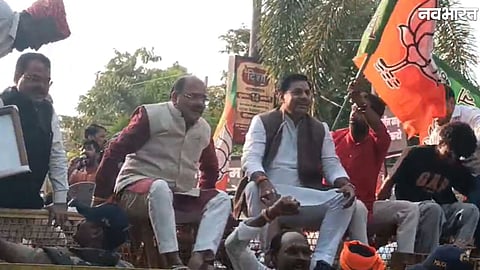 BJP and Congress workers face off outside the Congress office in Bhopal