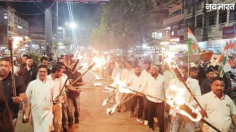 Youth Congress leaders and workers take out a torch rally in Sagar