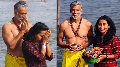 Milind Soman in yellow dhoti took Amrit Snan with his wife on Mauni Amavasya in Maha Kumbh