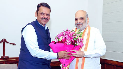 CM Fadnavis met Amit Shah reshuffle in Maharashtra cabinet