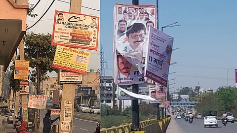 बिजली के खंभों पर लटक रहे बैनर