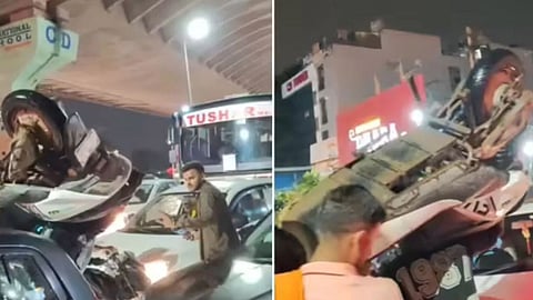 VIDEO: जाम में फंसे युवक का गजब करतब, फिल्मी स्टाइल में किया सड़क पार, लोग बोले-‘यह है असली बाहुबली’