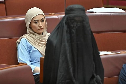 Senator Pauline Hanson enters Australian Parliament wearing a burqa