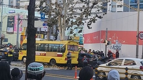 A car coming from the wrong side of the road collided with a bus, killing a woman and injuring several people in South Korea.