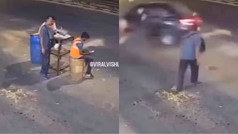 A speeding car crashed into an MCD worker sitting in the middle of the road, and the shocking video is now going viral on social media.