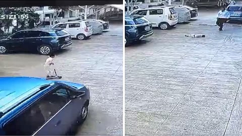 A heartbreaking viral video shows a child being crushed by a car while playing on a toy scooter inside a society.