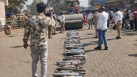 wardha traffic police destroy 150 modified silencers with bulldozer