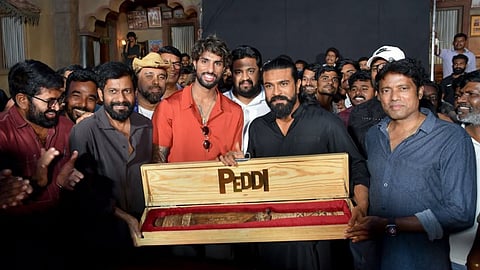 Tilak Varma Ram Charan Peddi Movie Set Visit Gift bat Buchi Babu Sana Janhvi Kapoor